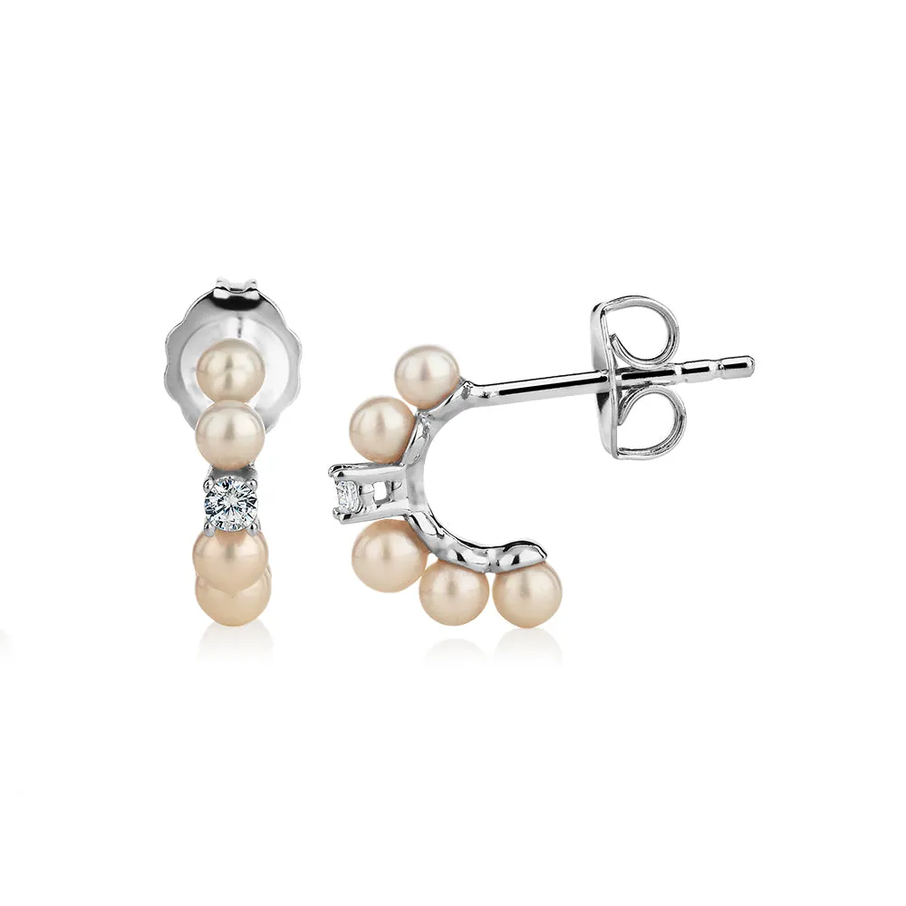 Cultured freshwater pearl stud earrings in sterling silver